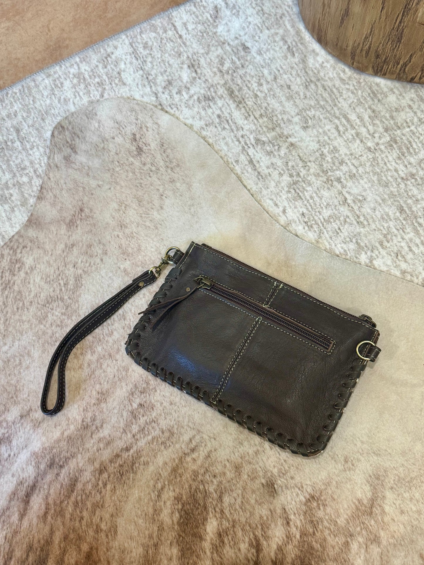 Black/White Hair on Hide W/Dark Brown Tooled Leather. Crossbody/Wristlet