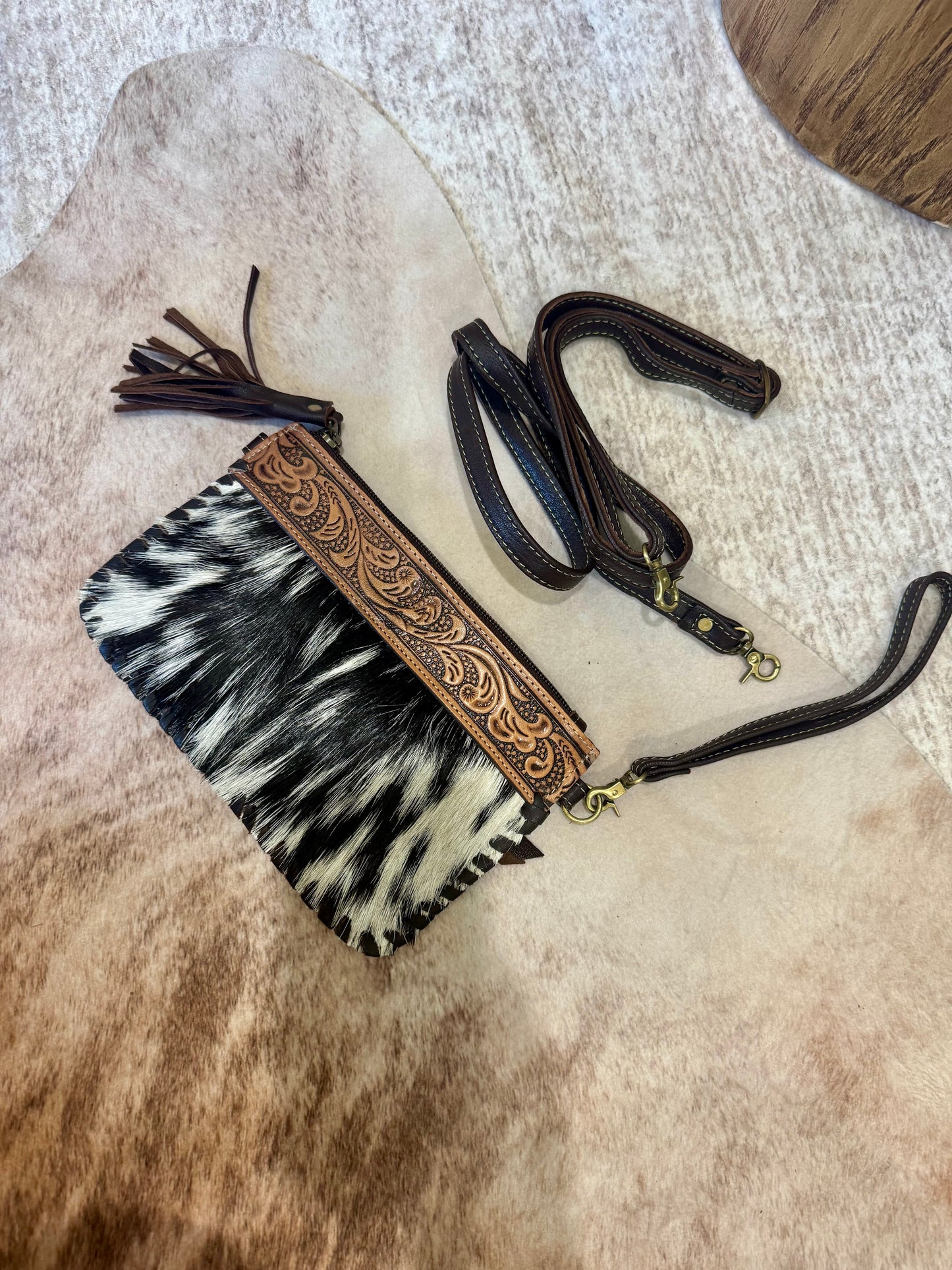 Black/White Hair on Hide W/Dark Brown Tooled Leather. Crossbody/Wristlet